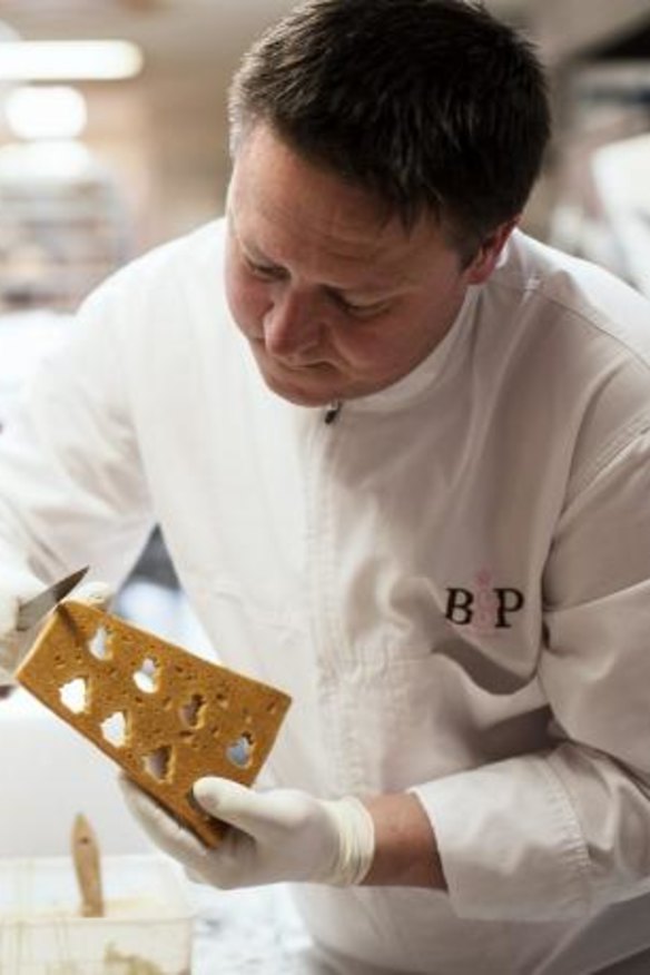 Darren Purchese, from Burch and Purchese,  preparing the modern gingerbread house.