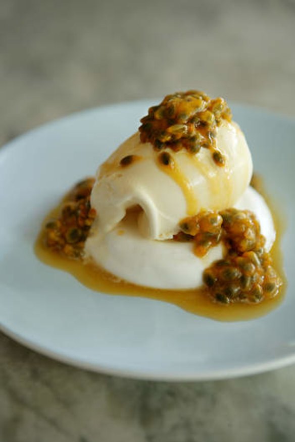 Meringue with ice-cream and passionfruit topping.