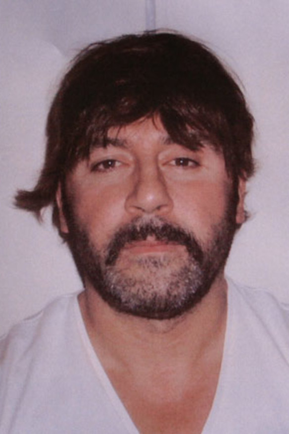 Rug lord: Tony Mokbel was arrested in Greece while wearing this absurd wig.