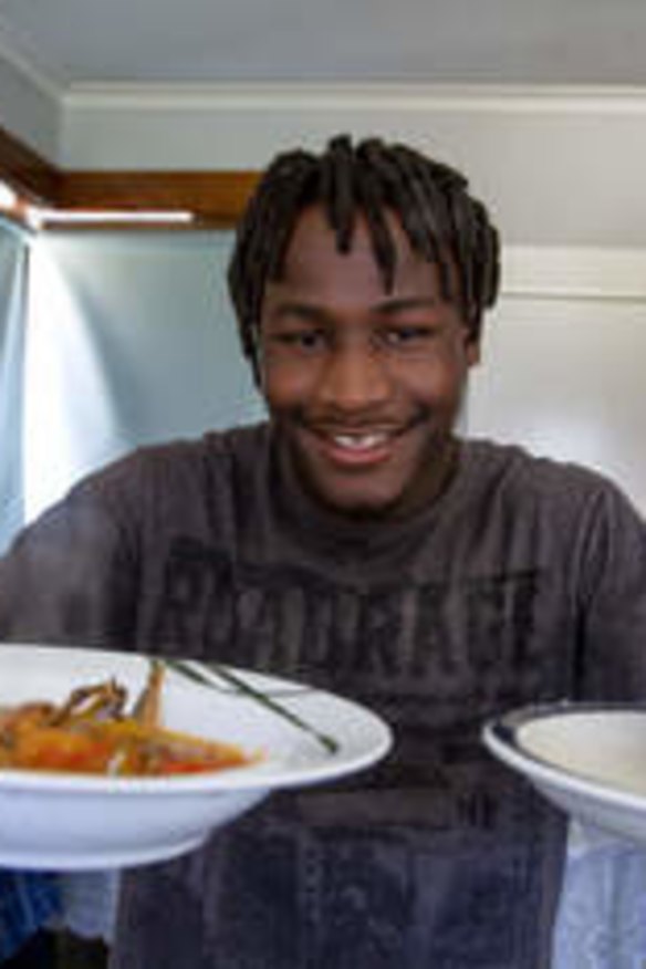 G Storm with his native African dish, fufu.