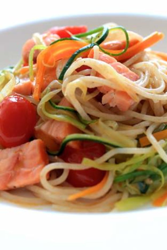 Spaghettini with hot-smoked salmon and vegetables.