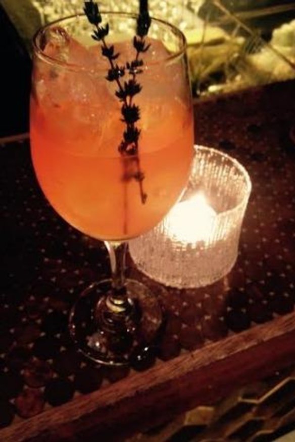 The house spritz with thyme-infused aperol, orange soda and prosecco.