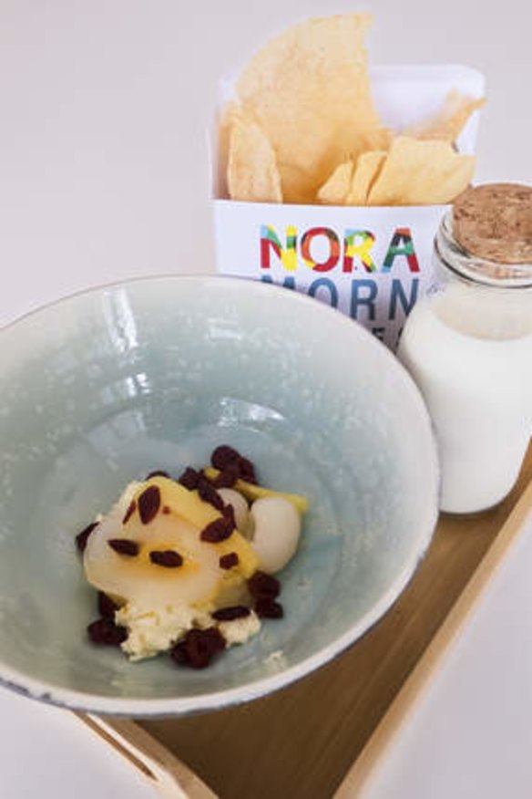 'Nora Flakes' with lemongrass and ginger curd, seeds, nuts, fruit and coconut.