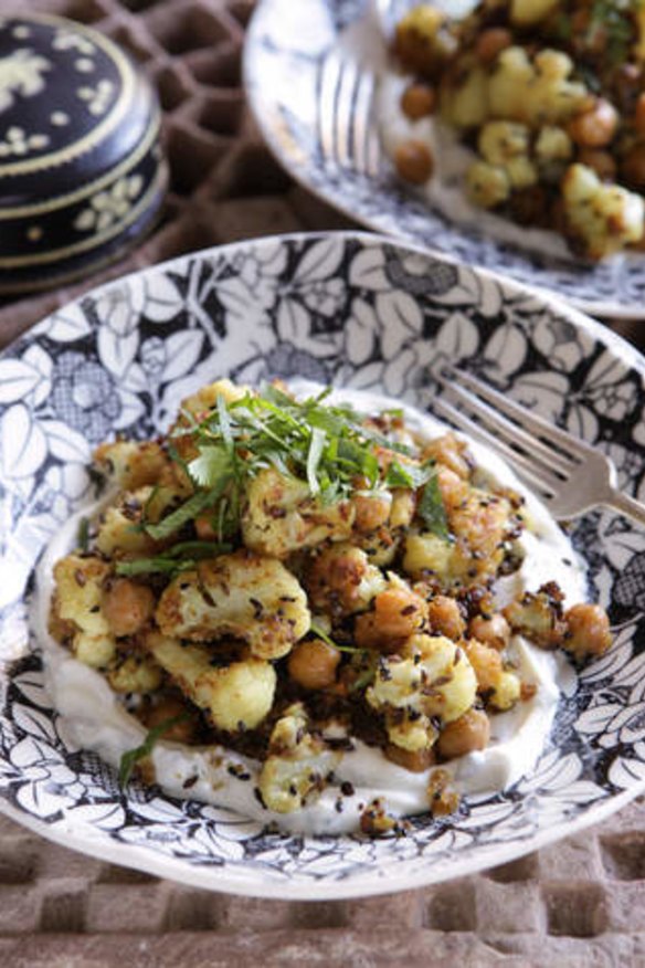 Spicy cauliflower and chickpeas with minted yoghurt.