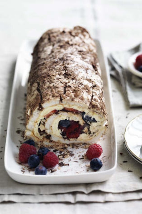 Blueberry, raspberry and strawberry roulade cake.
