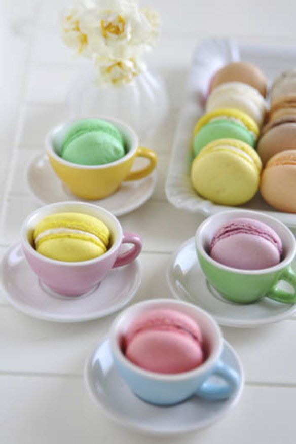 Macarons in teacups.