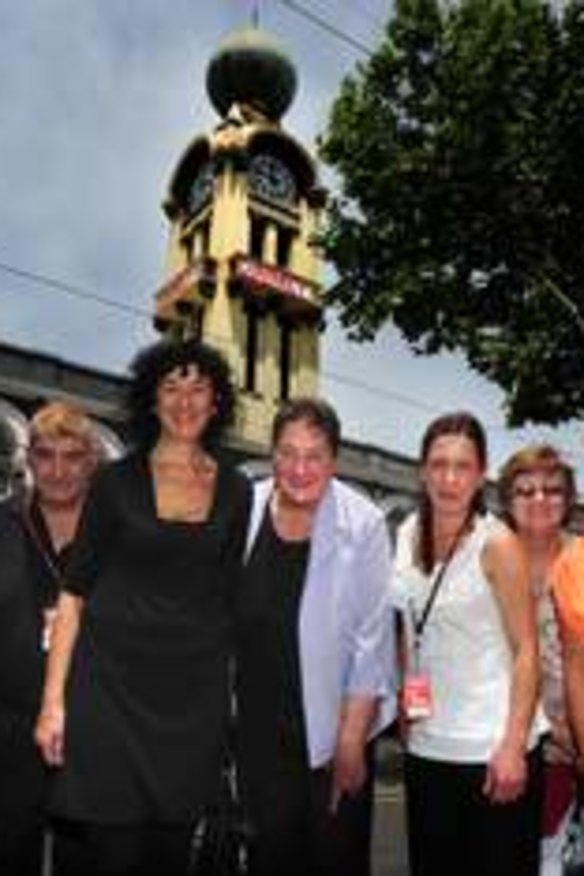 Staff and long term customers outside Dimmeys on Swan St.