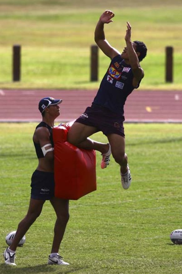 Up there, Izzy ... Minto-born Israel Folau practises going for the high ball.