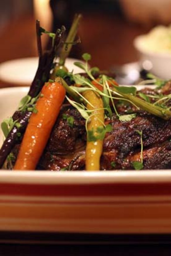 Roast for two: eight-hour roasted lamb shoulder served with mash, heirloom carrots and red wine jus.