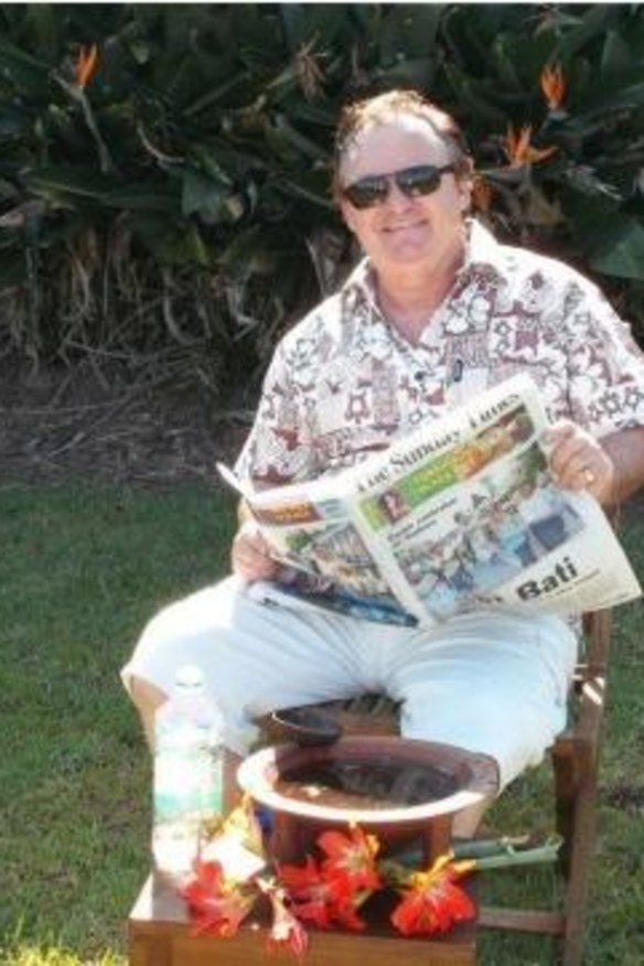 In this image supplied by Peter Foster, the conman is seen reading the Fiji Sunday Times newspaper with what he claims is a bowl of kava in front of him. Foster supplied this image after being challenged by Fairfax Media to prove he was actually in Fiji.
