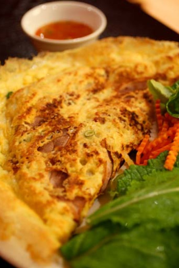 THE ONE DISH YOU MUST TRY Banh xeo: crisp pancake stuffed with bean sprouts, mung beans, pork and prawns, $12.