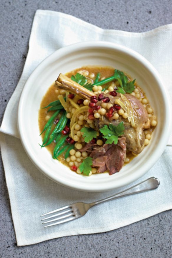 Lamb tagine with giant coucous and pomegranate jewels.