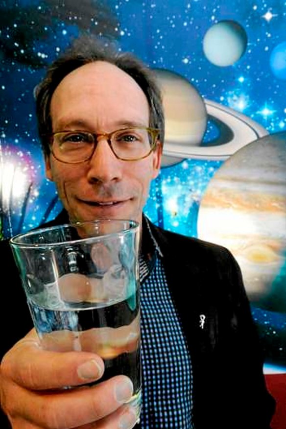 Theoretical physicist Lawrence Krauss with a glass of star stuff, aka water, at CSIRO Discovery Centre.
