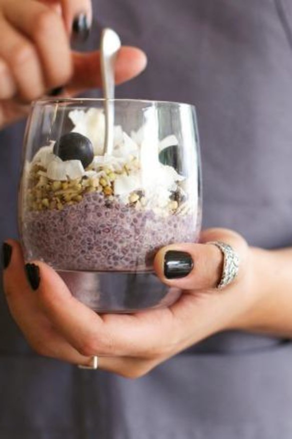 Chia pudding with almond milk, granola, blueberries and coconut.
