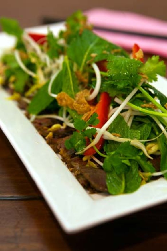 Feel-good food: Barbecue sweet soy beef with hot and sour herb.