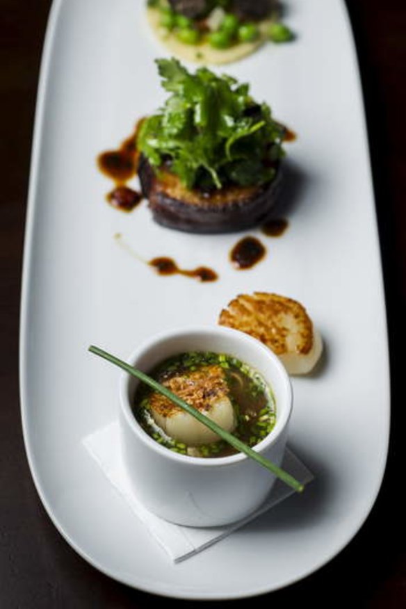 Trio of entrees, Scallop, Ravioli and Pork at Pistachio restaurant.