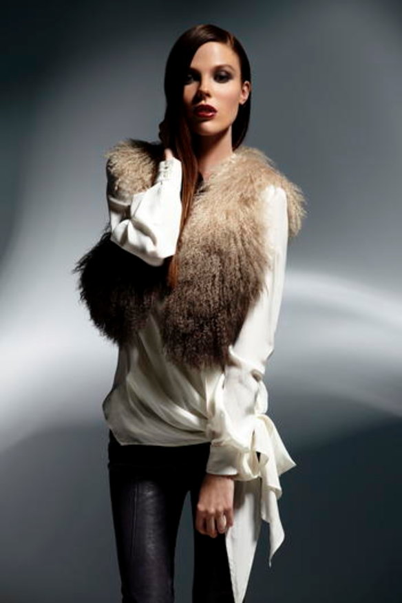 Arthur Galan Mongolian fur vest, $449; tie-side slouch blouse, $279; stretch leather pant, $698.