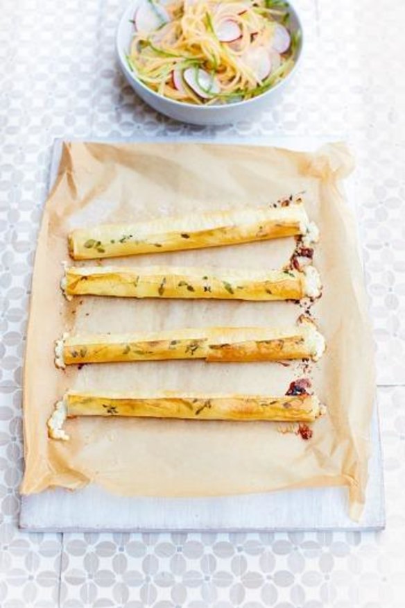 Baked goat's cheese cigars with melon, radish and cucumber slaw.