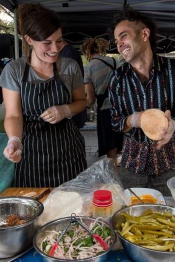 Louisa Allan and Shuki Rosenboim at the Melbourne University farmers' market, where their falafels are in high demand.