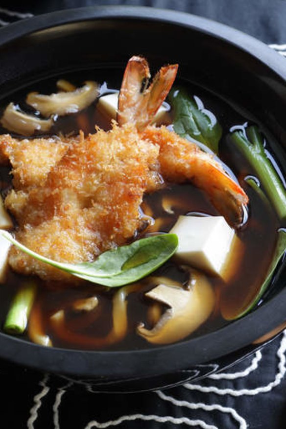 Udon noodle soup with crumbed prawn cutlets.