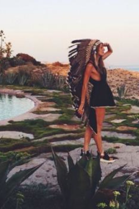 Stylist: "Vogue Japan" editor Anna Dello Russo posed for a picture of herself in a knee-length war bonnet.