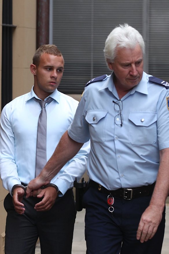 Kieran Loveridge (left) is escorted from the NSW Supreme Court after being sentenced for the manslaughter of Thomas Kelly.