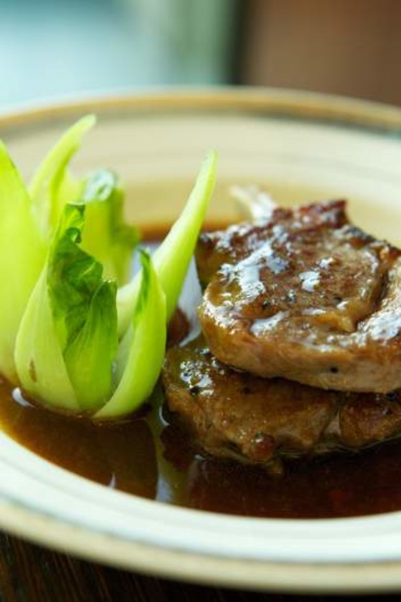 Lamb cutlets with cumin-scented abalone sauce.