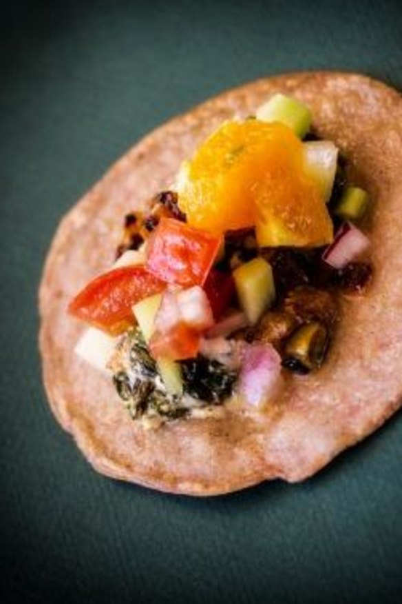 The finished product: Blue-corn tortilla with braised greens and salsa.