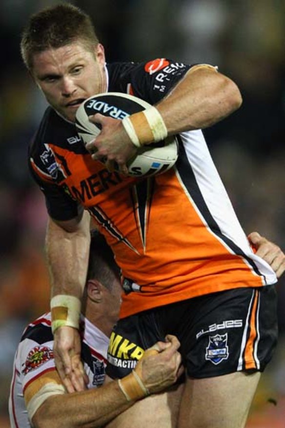 Strong run ...  Lawrence bursts through a tackle.