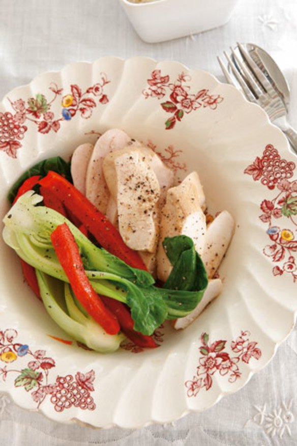 Steamed chicken with stir-fried vegetables.