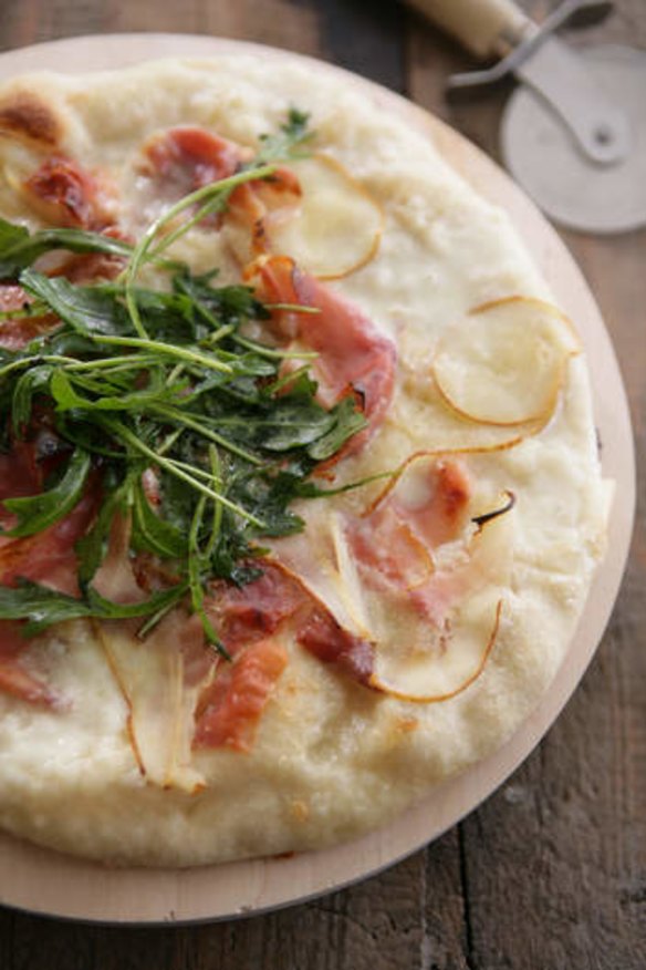 Pizza with taleggio, prosciutto and pear.