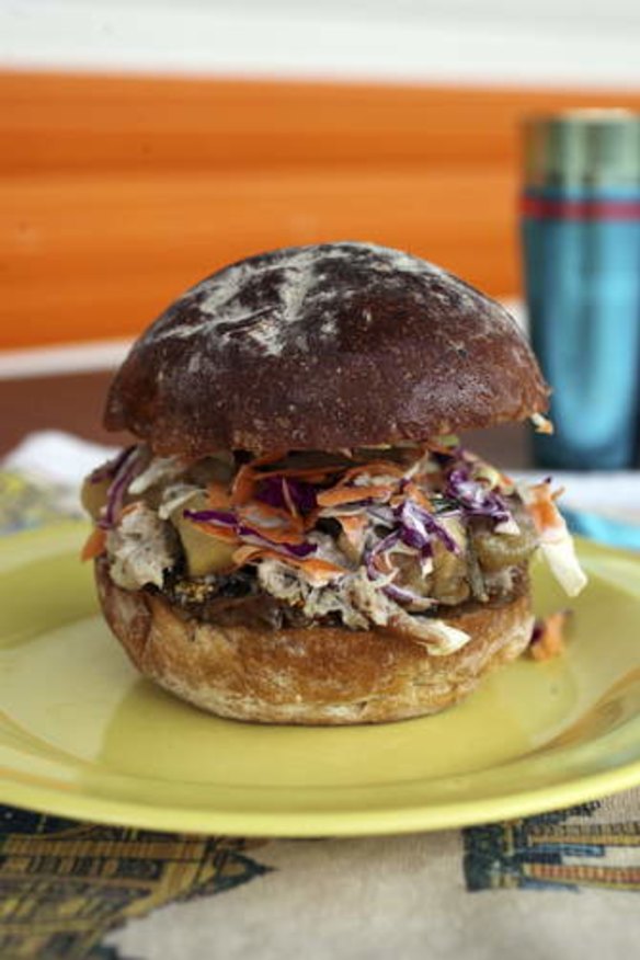 Must try ... pulled pork with smashed rosemary apples and tangy slaw on a fresh sweet potato and honey roll.