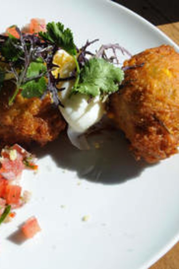 The corn fritters with poached egg at Addict Food and Coffee, Fitzroy.