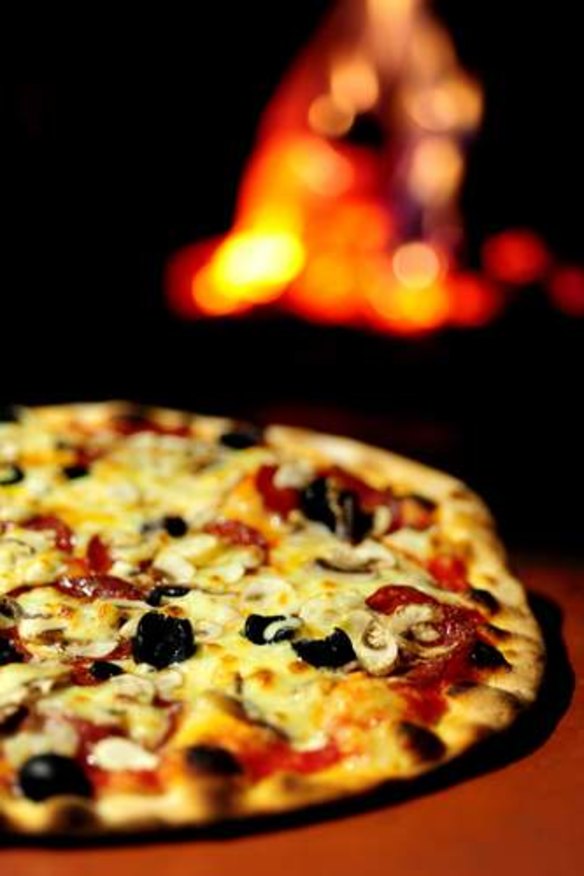 A wood-fired pizza at Pizza Gusto makes great winter eating.