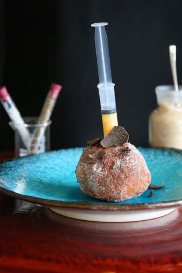 The truffle doughnut with creme anglaise injection.