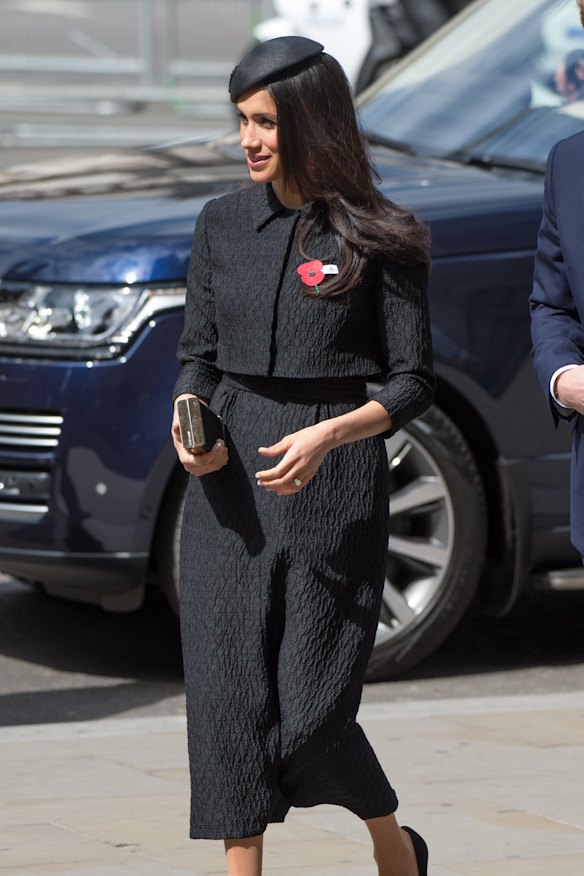 Meghan Markle, wearing a black Emilia Wickstead jacket and skirt and a Philip Treacy hat, attends the Anzac Day service at Westminster Abbey in London on April 25.