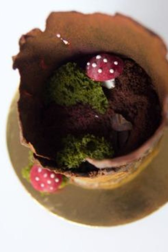 The dessert hides hand-made chocolate mushrooms, chocolate soil and pistachio sponge. 