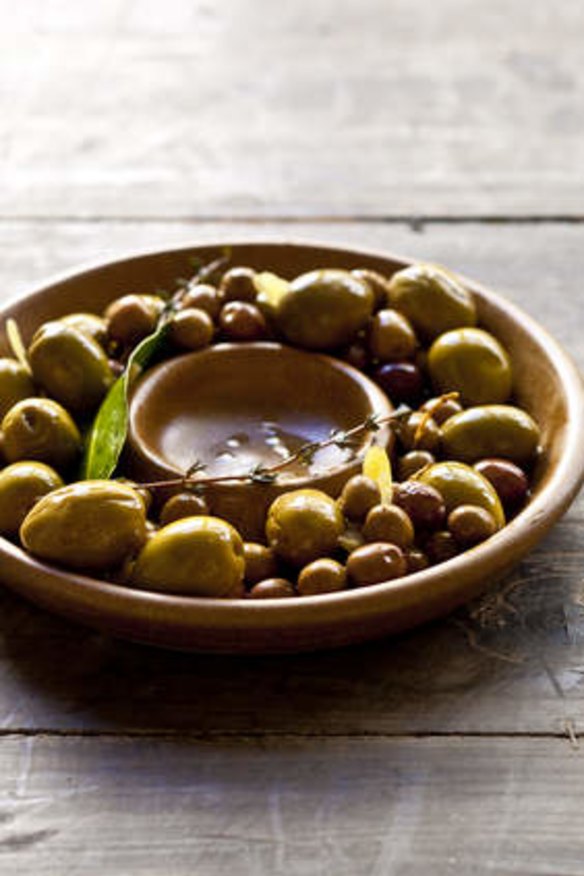 A warm welcome: Marinated olives make an easy appetiser.