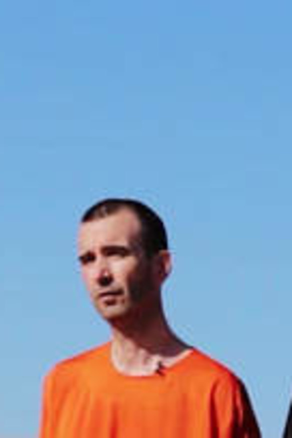 A video purportedly showing threats being made to a man Islamic State (IS) named as David Haines.