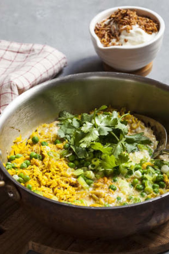 Quick curried rice with egg, spring onions and peas.