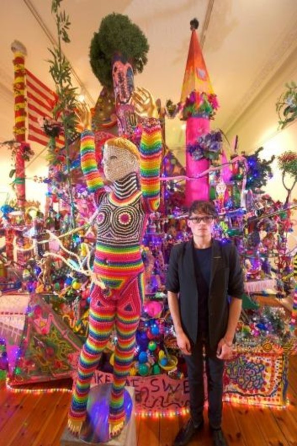 Paul Yore with his art installation <i>Everything is F----ed</i>.