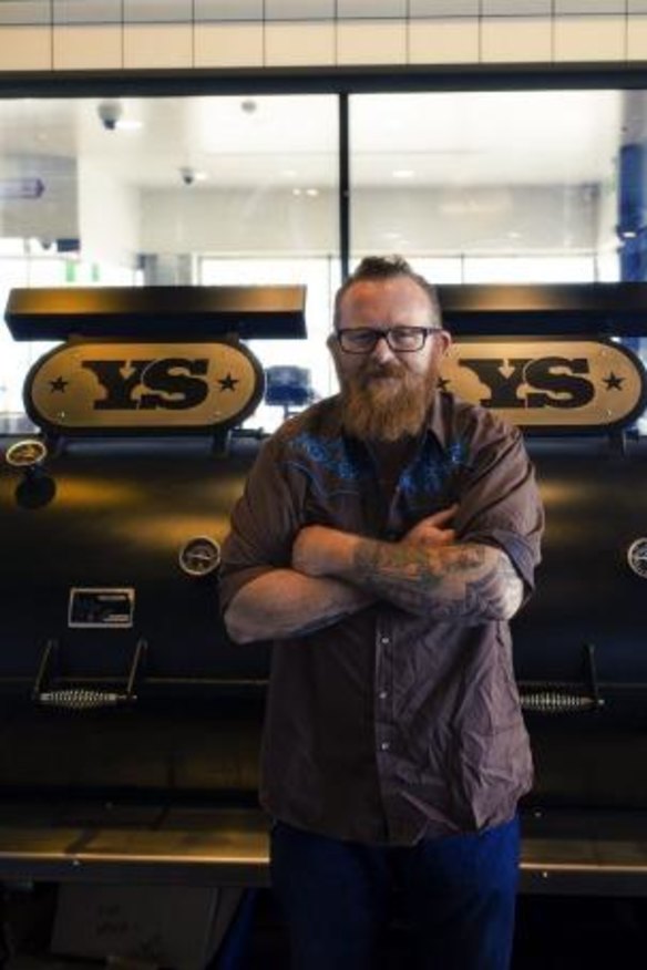 Wes Griffiths with his meat smoker at Vic's Meat Market. 