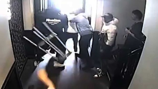 Suspected Melbourne City FC supporters storm a pub in Cremorne in a violent altercation with rival fans