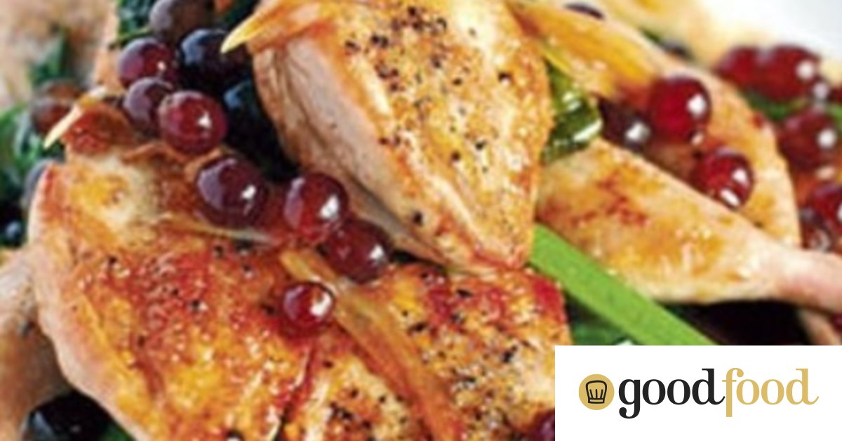 Panfried quails with spinach and currant grapes