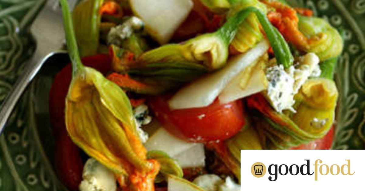 Zucchini flower salad with tomato and stilton cheese
