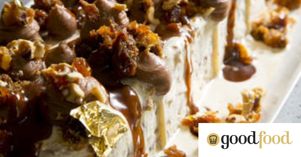 Plum pudding icecream with caramel sauce and hazelnut praline