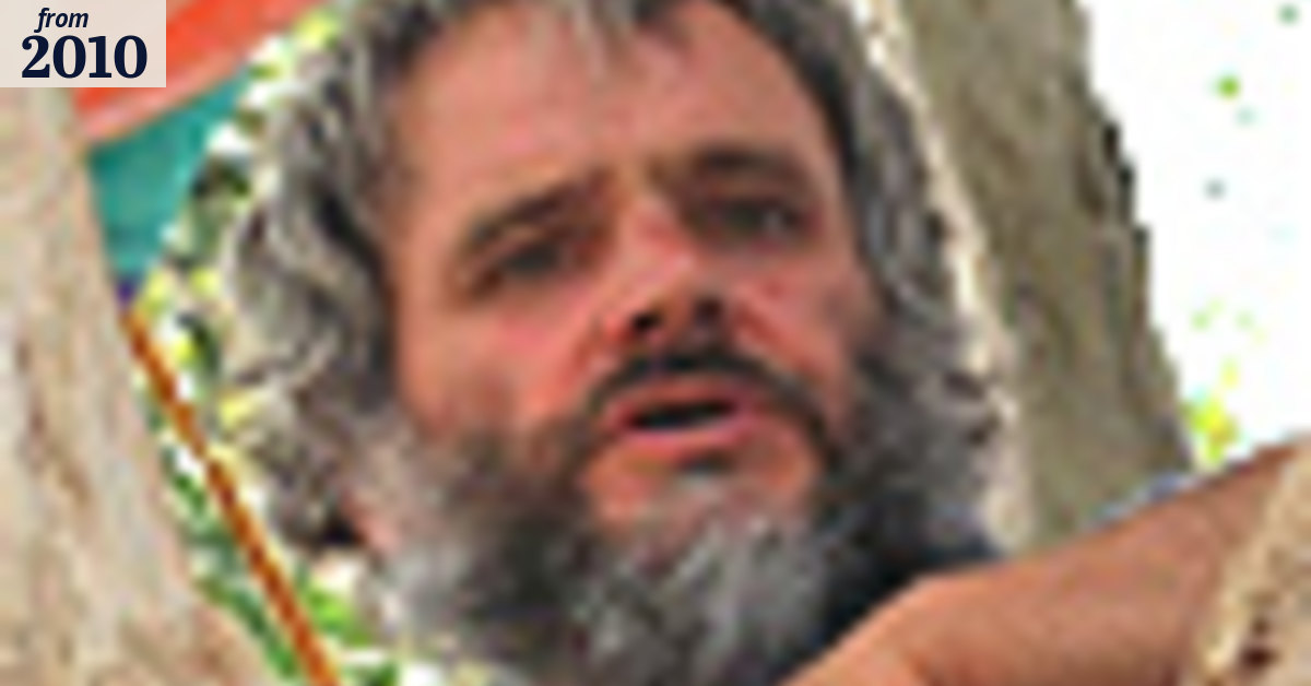 Tree man comes down after four months