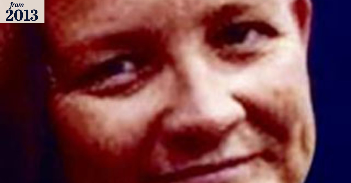 Man arrested over dead woman found in car boot