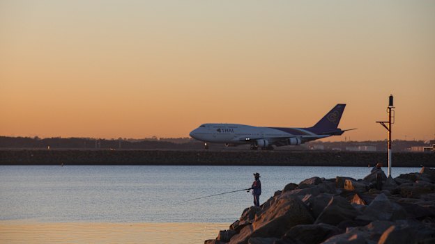 A rock fisherman fishes at Botany Bay at the mouth of the Cooks River, where the EPA has issued  warnings about eating too much of certain fish beacuse of chemical concentrations.