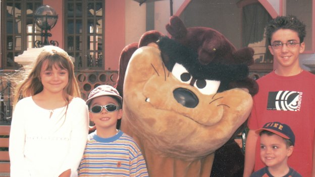 On a family holiday at Movieworld in 2004 (from left) Courtney, Zachary, Brodie and Kris.